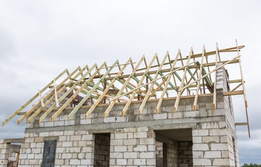 Roof of unfinished house in countryside