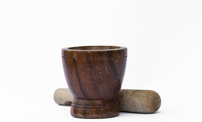 Mortar and pestle made of  Wood used for pounding or grinding he