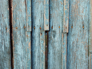 Fragment of an old wooden fence closeup