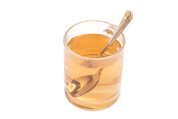 Cup Of Tea with Spoon Isolated On White