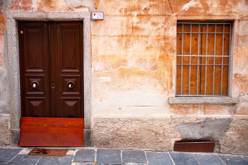 wooden door and ruined wall