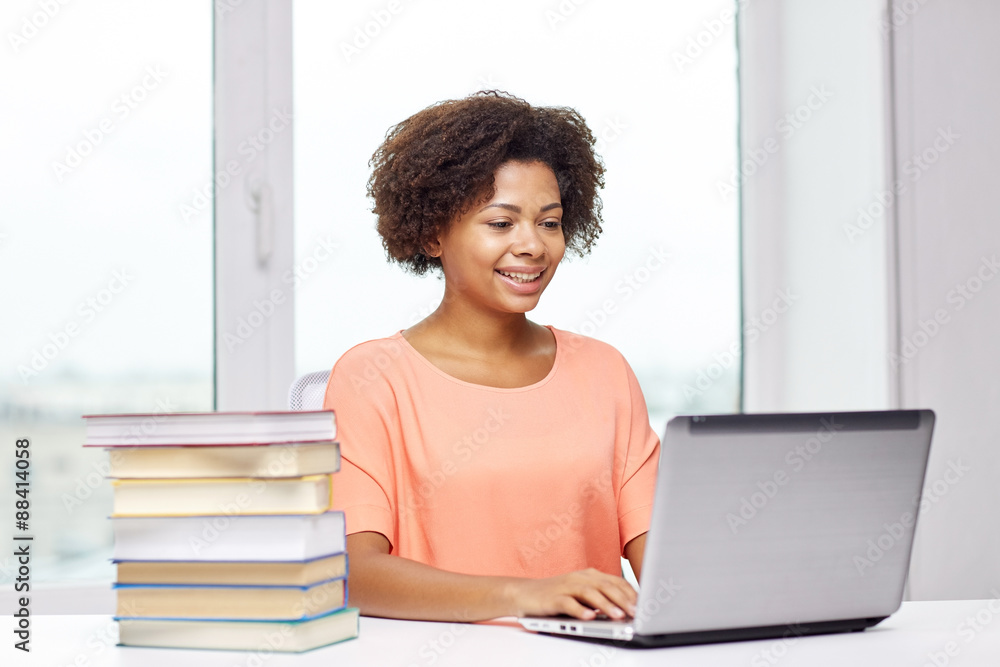 Canvas Prints happy african american woman with laptop at home