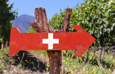 Switzerland Flag wooden sign with winery background