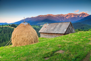Alpine rural landscape with old wooden barn,Transylvania,Romania,Europe