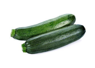 green zucchini vegetables isolated on white