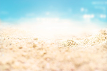 Fototapeta na wymiar Sea sand beach summer day and nature background, soft focus