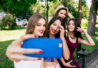 four beautiful young girls make selfie 