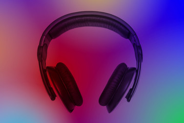 Fototapeta na wymiar Headphones over colorful background
