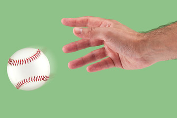 A hand throwing a baseball