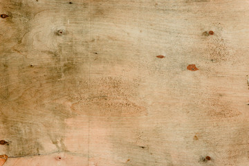 Wooden texture of yellow color with scratches and cracks, whichcan be used as a background