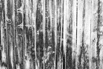 Wooden texture of grey color with scratches and cracks, whichcan be used as a background