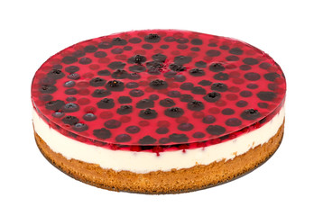 Cheesecake with blackberry, blueberry and red currants  isolated.