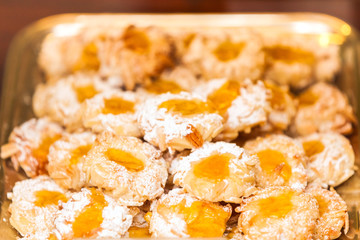 Italian tradicioanal tart cookies with peach jam and almonds