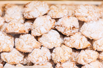 Italian oatmeal cookies with almonds on shop window display