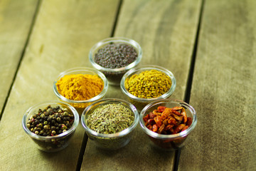 spices and seasonings on a wooden table