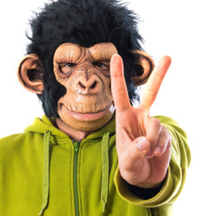 Monkey man doing victory gesture