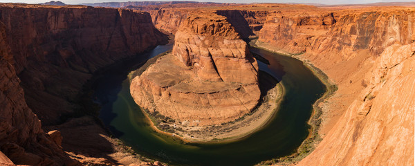 Horseshoe bend on a sunny day, Page, Arizona, USA. Panoramic image.