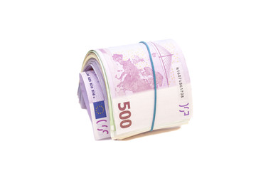 five hundredth euro banknotes under rubber band isolated