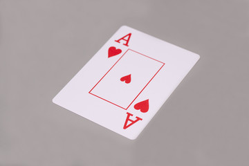ace playing card on gray background