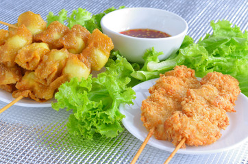 fried quail egg wrapped in wanton sheet and fried chicken