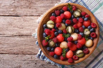 salad of fresh fruits and berries. horizontal top view
