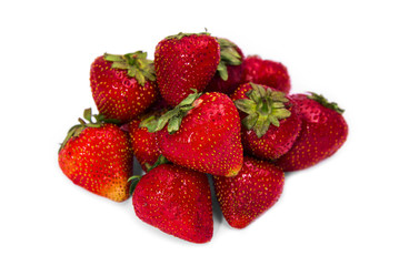 Lot of strawberries isolated on white background