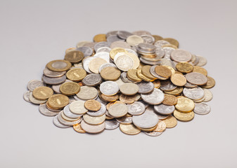Piles of coins isolated on gray