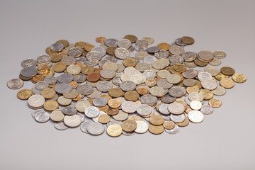 Piles of coins isolated on gray