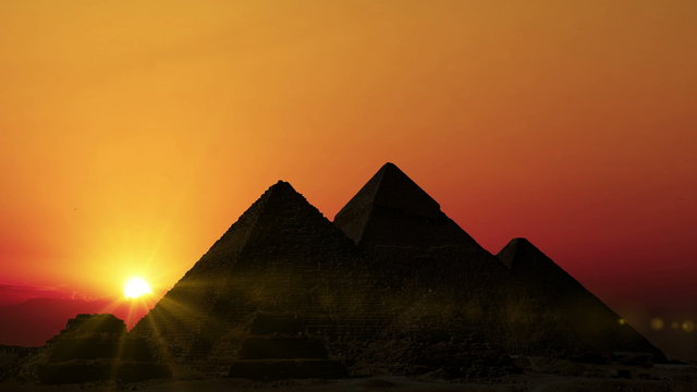Timelapse. Sunrise over pyramids. Giza Egypt.