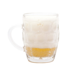 Glass mug with beer isolated on white background