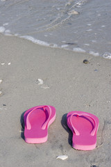 Fototapeta na wymiar Sandals on the Beach