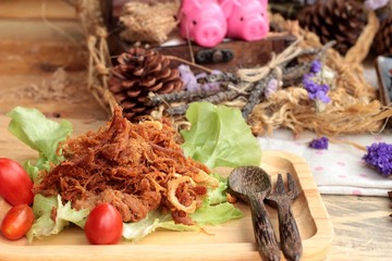 Dry roast pork into strips.
