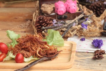 Dry roast pork into strips.