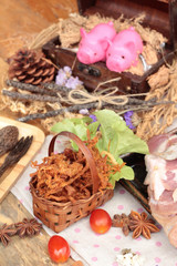 Dry roast pork into strips and raw pork.