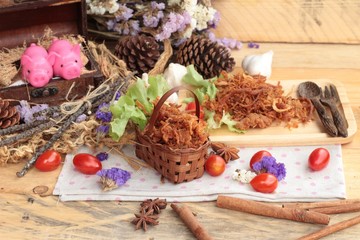 Dry roast pork into strips.