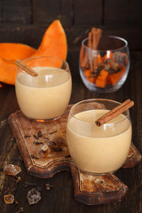 Pumpkin smoothie with cinnamon stick
