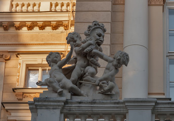 Fototapeta na wymiar Cherub statue on the Odessa opera theater