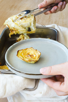 Rose-shaped oven baked cabbage slice on plate