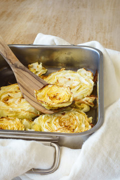 Closeup of baked slice of cabbage in baking form