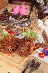 Dry roast pork into strips.