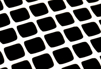 White net with squares on black background