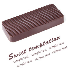 Bar of chocolate isolated on white and space for text