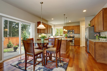 Modern kitchen with simple wood cabinets.