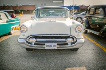 Obraz na płótnie Canvas Great amazing front view of vintage classic retro car