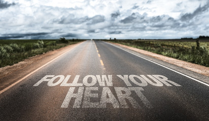 Follow Your Heart written on rural road