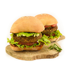 Closeup of home made burgers on white background