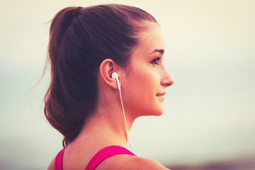 Fitness Woman Listening to Music