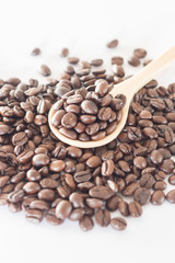 Spoon of roasted coffee bean