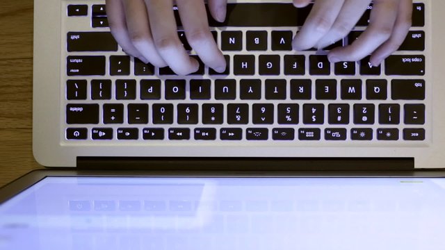 Typing on laptop keyboard