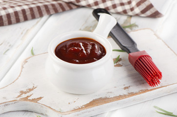 BBQ sauce in  white bowl